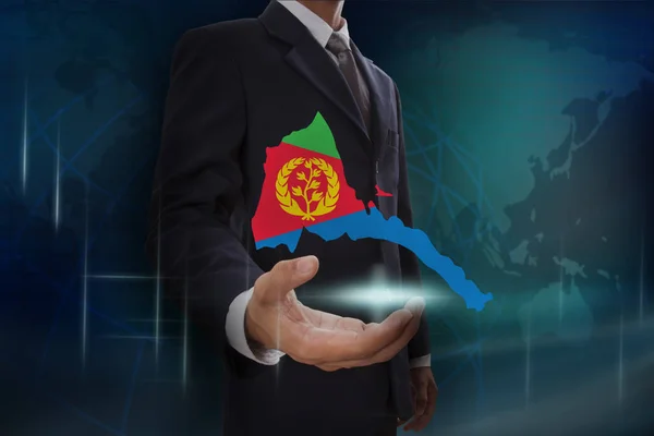 Liikemies, jolla on kartta ja Eritrean lippu — kuvapankkivalokuva