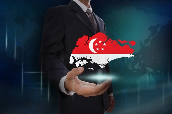 Businessman with map and flag of Singapore — Stock Photo, Image