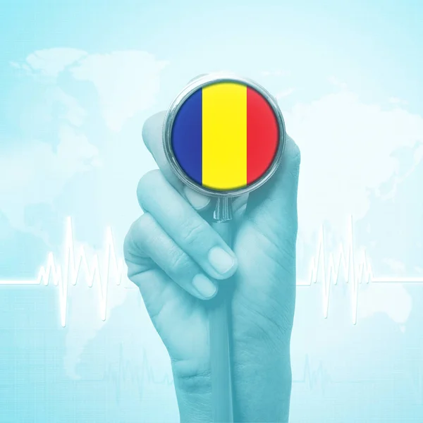 Doctor hand holding stethoscope with Chad flag. — Stock Photo, Image