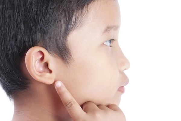 Pequeno dedo apontando do rapaz ao seu ouvido. — Fotografia de Stock