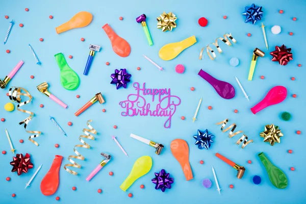 Happy birthday pattern. Festive candles, party confetti, balloons, streamers and decoration on blue background. Colorful celebration background