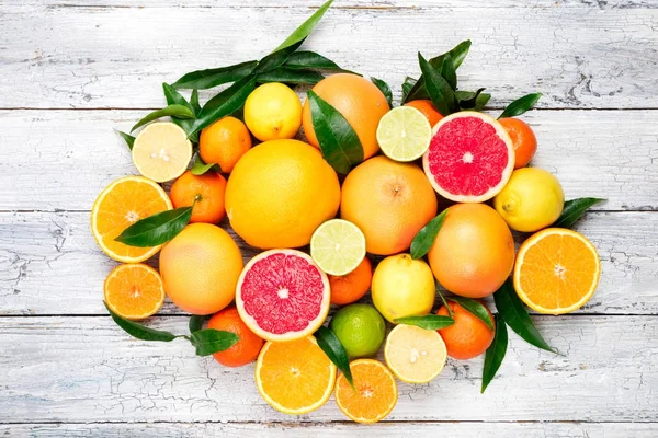 Fresh citrus fruits background. Orange, grapefruit, lemon, lime, tangerine — Stock Photo, Image