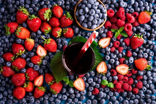 Berries juice with berries mix of strawberry, blueberry, raspberry and spices. Healthy summer drink