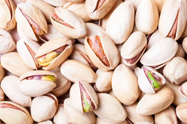 Pistachios background. Pistachio texture closeup. Nuts — Stock Photo, Image