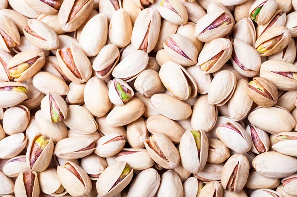 Pistachios background. Pistachio texture. Nuts — Stock Photo, Image