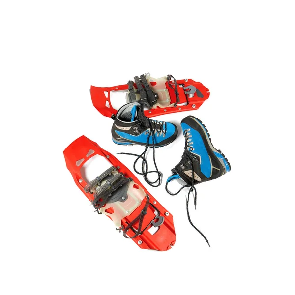 Mountaineering boots and snowshoes