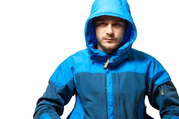 Montañero en una chaqueta azul Imagen De Stock