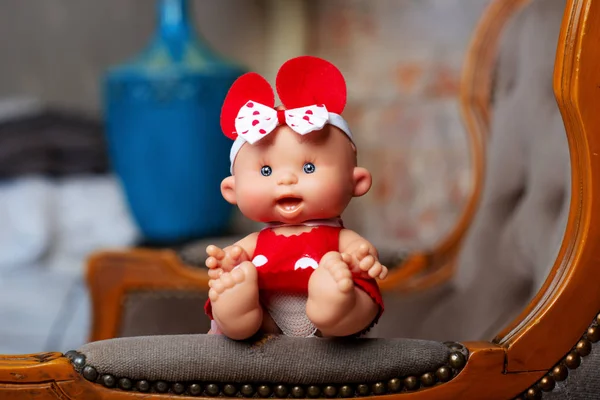 cute doll on a light textile