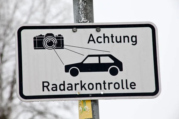 german language radar control sign warning car drivers about speed control. Text Translation \