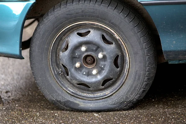 flat tire, damaged wheel on car lost aerial