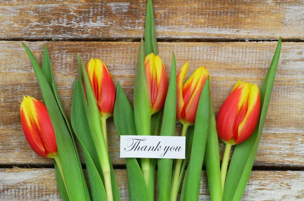Thank you card with red and yellow tulips — Stock Photo, Image