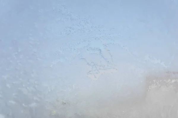 Textur der Frostmuster auf dem Fenster. abstrakter Winterhintergrund — Stockfoto