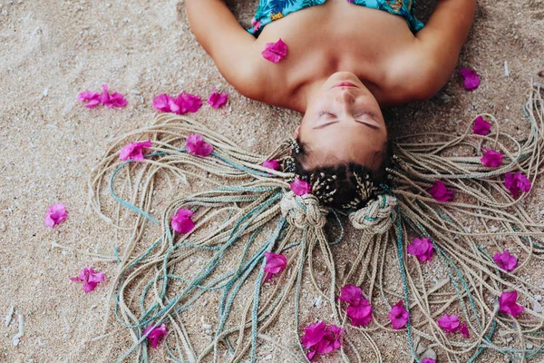 Young Woman Wearing Braids Hair Style Lying Sea Shore Pink — Stock Photo, Image