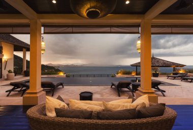 Luxury villa living room interior. Sea view  clipart
