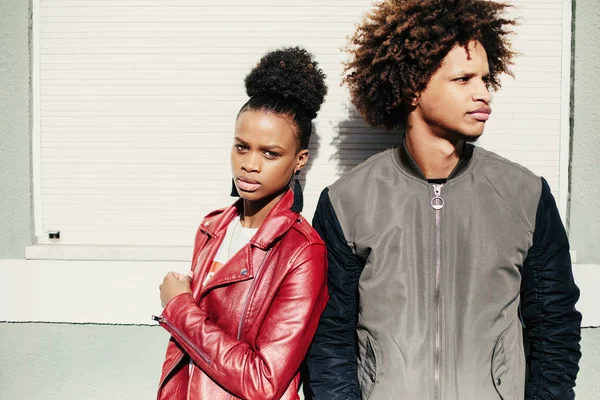 Young black teen couple. Dark skin, mixed race, voluminous african hair