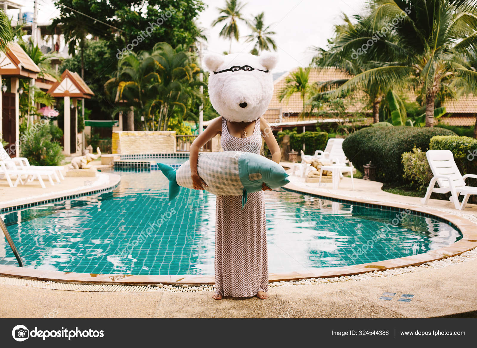 Funny Woman Dressed Polar Bear Holding Big Fish Staying Swimming.