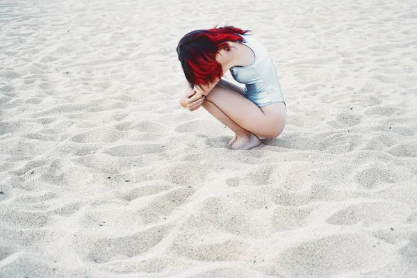 Young Female Model Wearing Red Hair Silver Swimsuit Seating Ocean — Stock Photo, Image