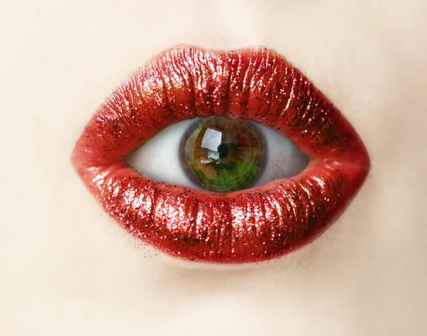 Red lips close up with eye inside. Fashion art concept