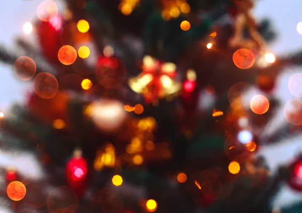 Fundo da árvore de Natal com borrado, faísca, brilhante. Feliz Ano Novo e tema de Natal — Fotografia de Stock