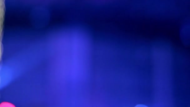 抽象的なボケ照明カメラ レンズぼかし文字列ライト コンサート ステージ上 — ストック動画