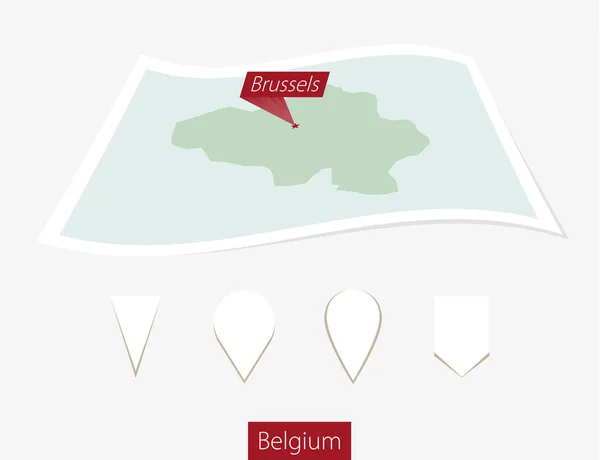 Carte papier de La Belgique avec la capitale Bruxelles sur fond gris . — Image vectorielle