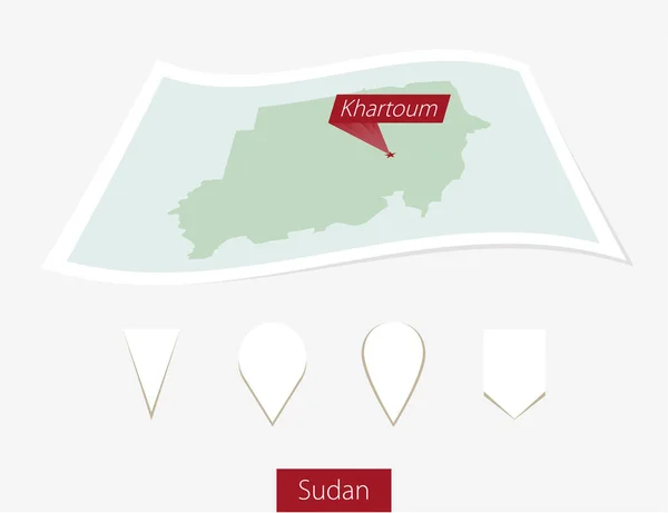 Carte papier incurvée de Soudan avec capitale Khartoum sur fond gris . — Image vectorielle