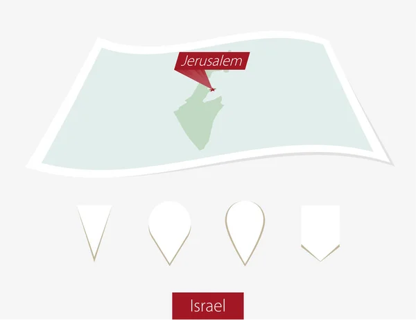 Gebogen papieren kaart van Israël met hoofdstad Jeruzalem op grijze achtergrond. — Stockvector