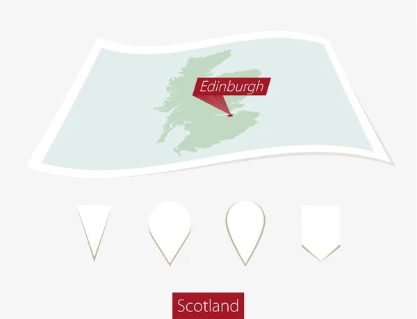 Curved paper map of Scotland with capital Edinburgh on Gray Background. — Stock Vector