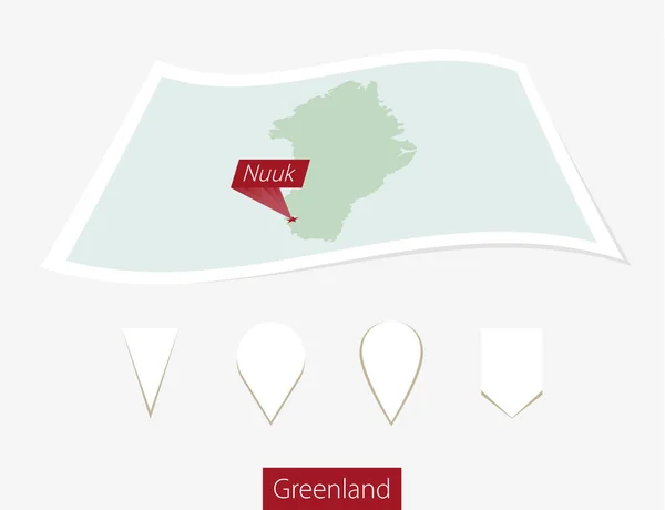 Gebogene Papierkarte von Grönland mit Hauptstadt nuuk auf grauem Hintergrund. — Stockvektor