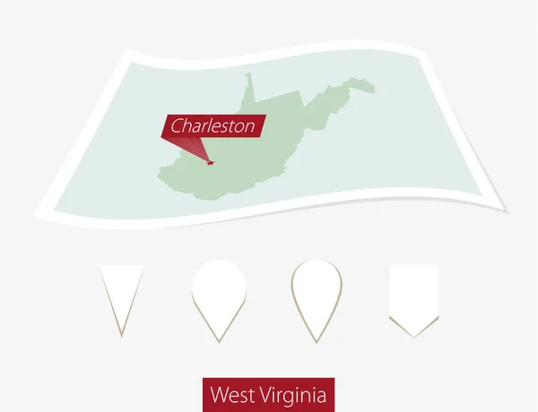 Gebogene Papierkarte des westvirginia Staates mit Hauptstadt Charleston auf grauem Hintergrund. — Stockvektor