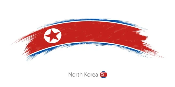 Yuvarlak grunge fırça darbesi Kuzey Kore bayrağı. — Stok Vektör