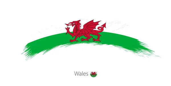 丸みを帯びたグランジ ブラシ ストロークでウェールズの旗. — ストックベクタ