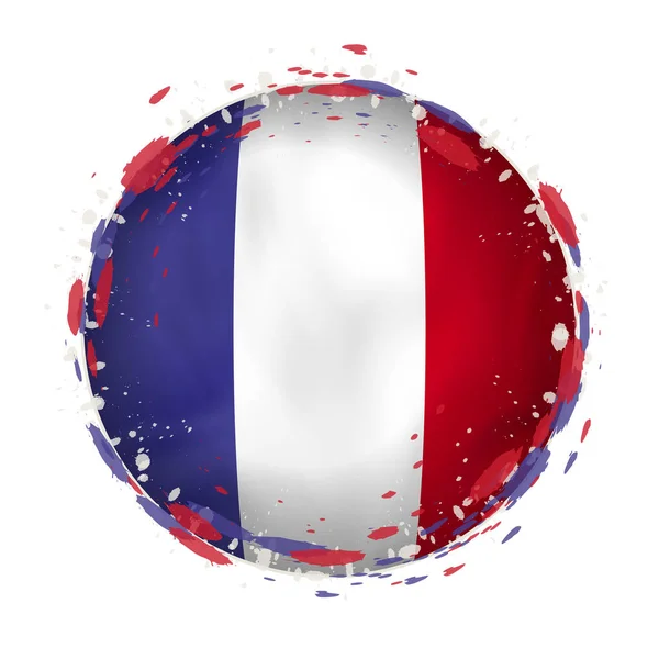 Runde Grunge-Flagge von Frankreich mit Spritzern in Fahnenfarbe. — Stockvektor
