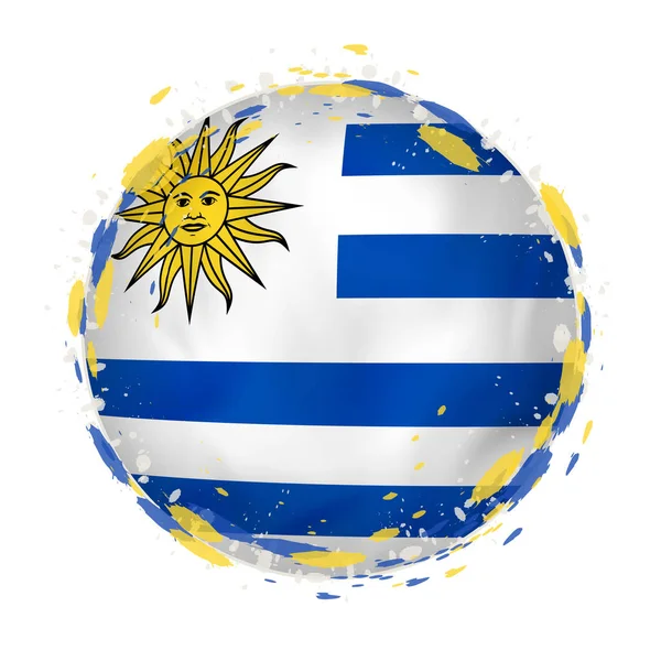 Bandera grunge redonda de Uruguay con salpicaduras en el color de la bandera . — Archivo Imágenes Vectoriales