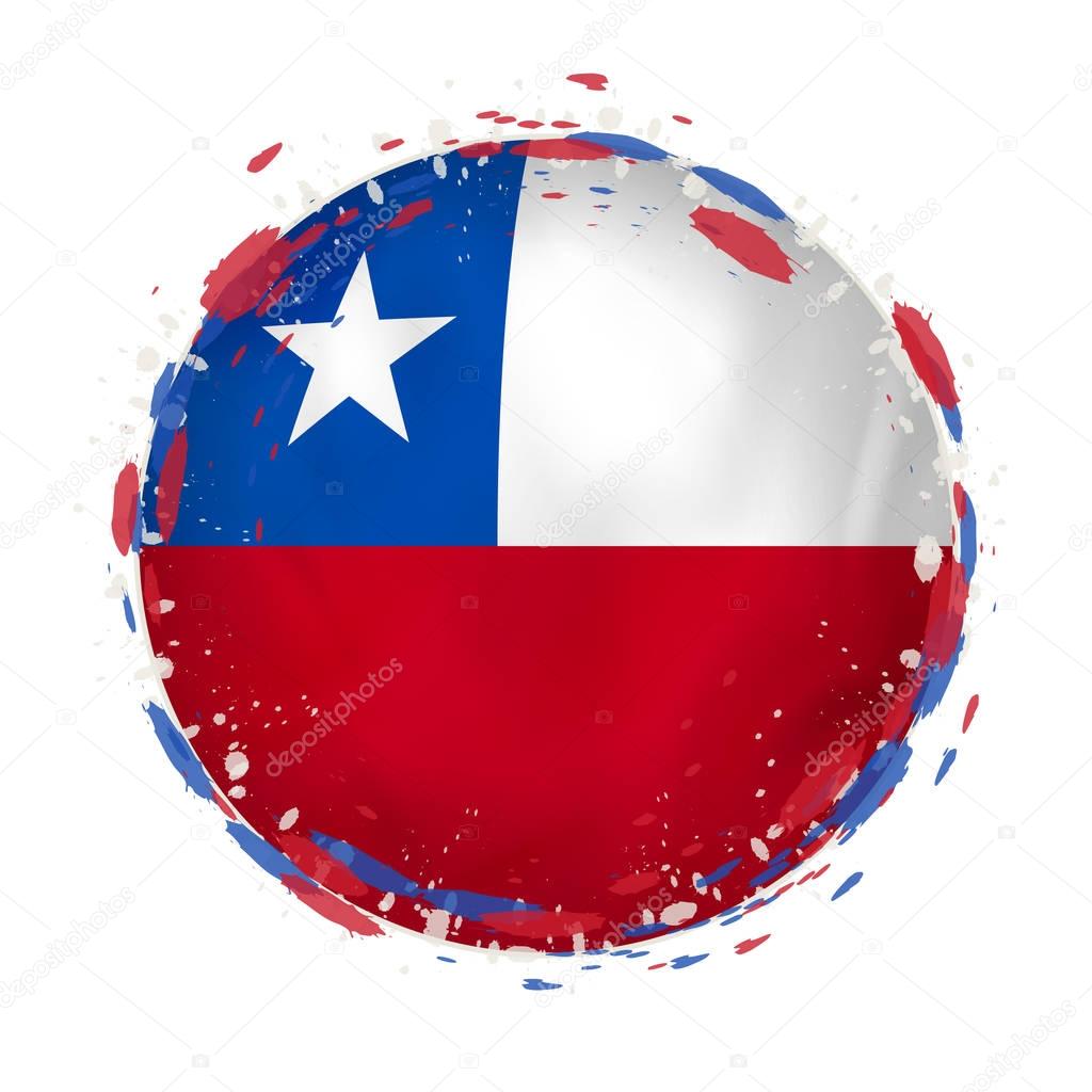 Round grunge flag of Chile with splashes in flag color. 