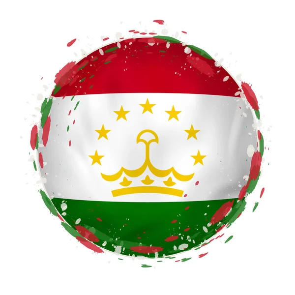 Kulaté grunge Vlajka Tádžikistánu s šplouchání v barvy příznaku. — Stockový vektor