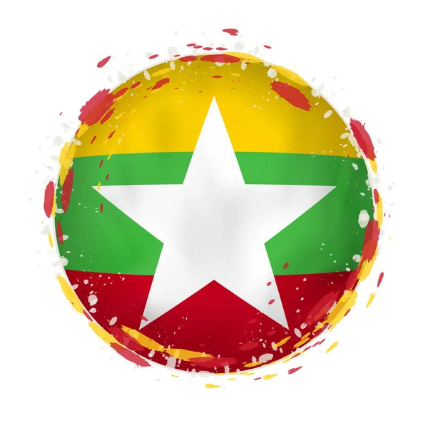 Bandera grunge redonda de Myanmar con salpicaduras en el color de la bandera . — Vector de stock