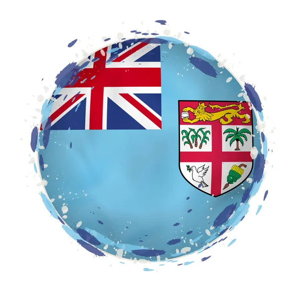 Bandera grunge redonda de Fiji con salpicaduras en el color de la bandera . — Vector de stock