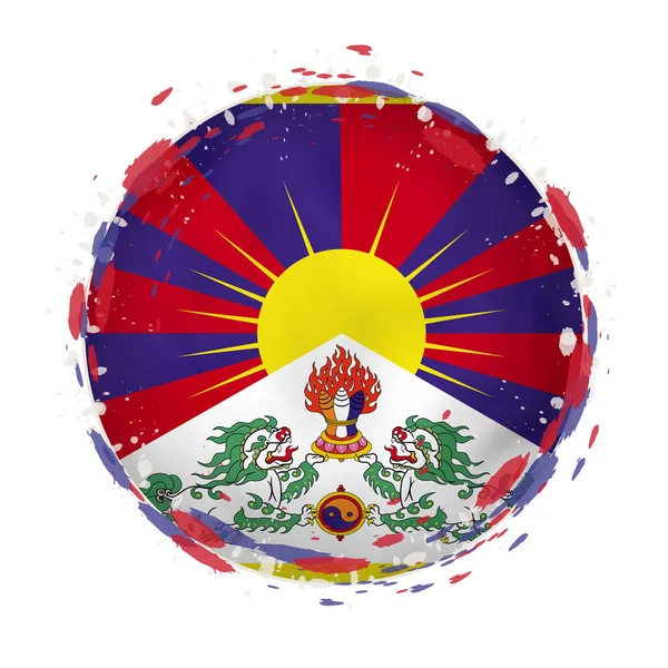 Runde Grunge-Flagge von Tibet mit Spritzern in Flaggenfarbe. — Stockvektor