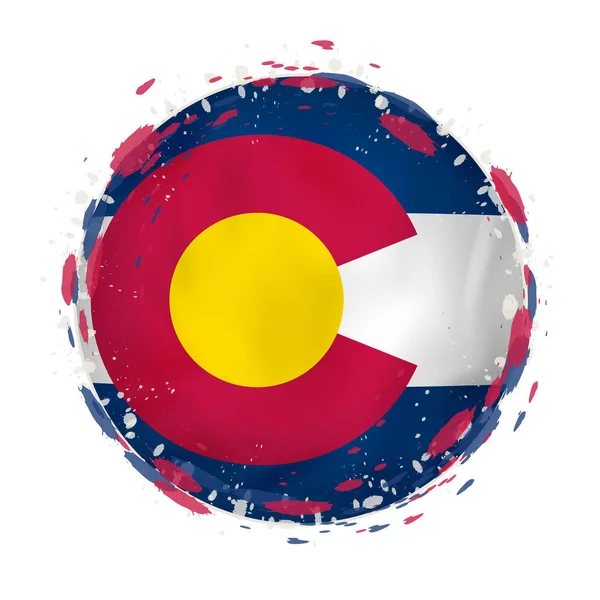 Round grunge flag dello stato USA del Colorado con spruzzi di colore della bandiera . — Vettoriale Stock