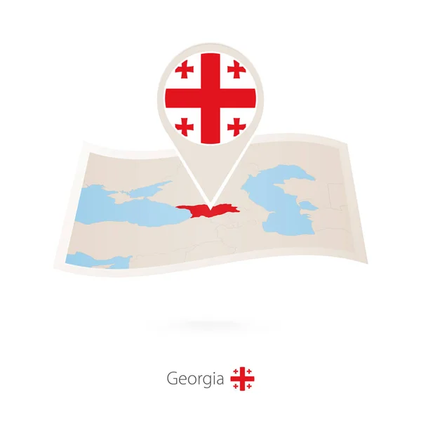 Mapa en papel plegado de Georgia con pasador de bandera de Georgia . — Vector de stock