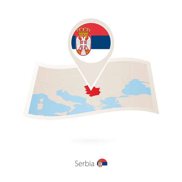 Skládané papírové mapy Srbska s vlajkou pin Srbska. — Stockový vektor