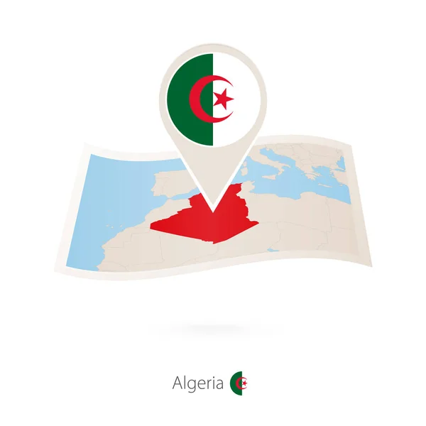 Vikta papperskarta över Algeriet med flagga pin av Algeriet. — Stock vektor