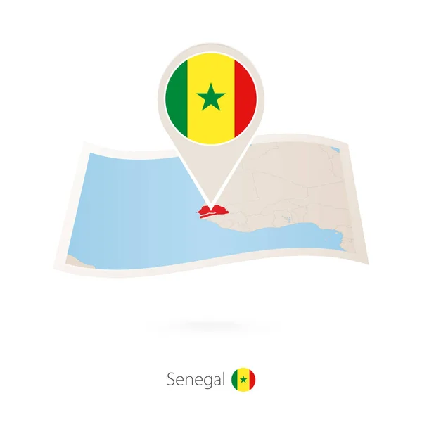 Skládané papírové mapy ze Senegalu s pin vlajka Senegalu. — Stockový vektor