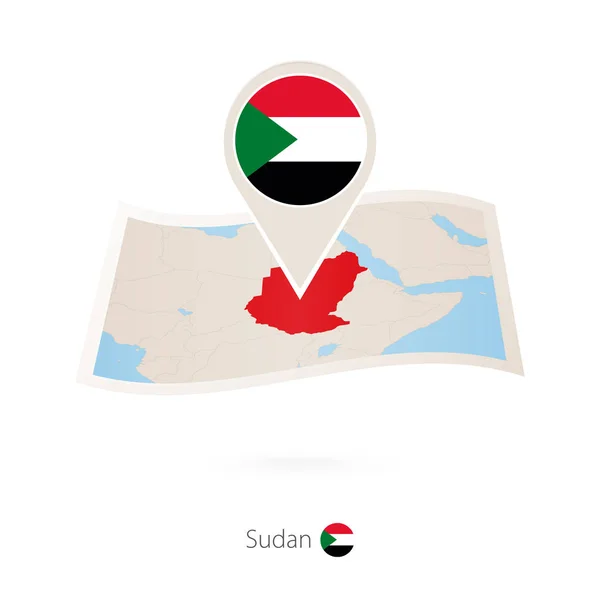 Mapa de papel dobrado de Sudão com pino de bandeira do Sudão . — Vetor de Stock