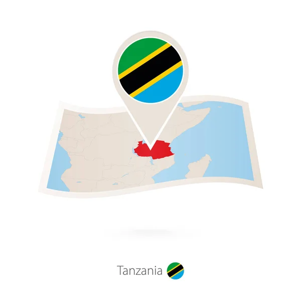 Διπλωμένο χαρτί Χάρτης Τανζανίας με pin σημαία της Τανζανίας. — Διανυσματικό Αρχείο