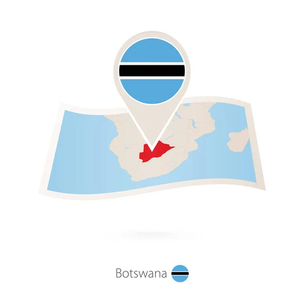 Διπλωμένο χαρτί Χάρτης Μποτσουάνα με σημαία καρφίτσα της Μποτσουάνα. — Διανυσματικό Αρχείο