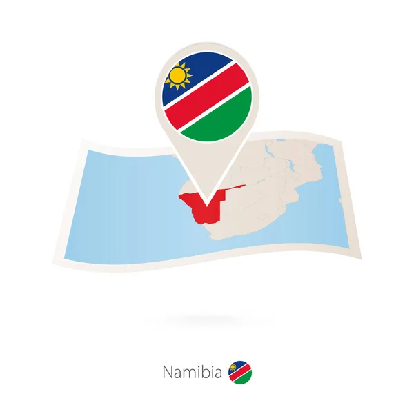 Mapa en papel plegado de Namibia con pasador de bandera de Namibia . — Archivo Imágenes Vectoriales