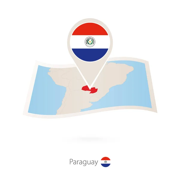 Folded paper map of Paraguay with flag pin of Paraguay. — Stock Vector