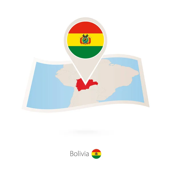 Skládané papírové mapy Bolívie s pin vlajky Bolívie. — Stockový vektor